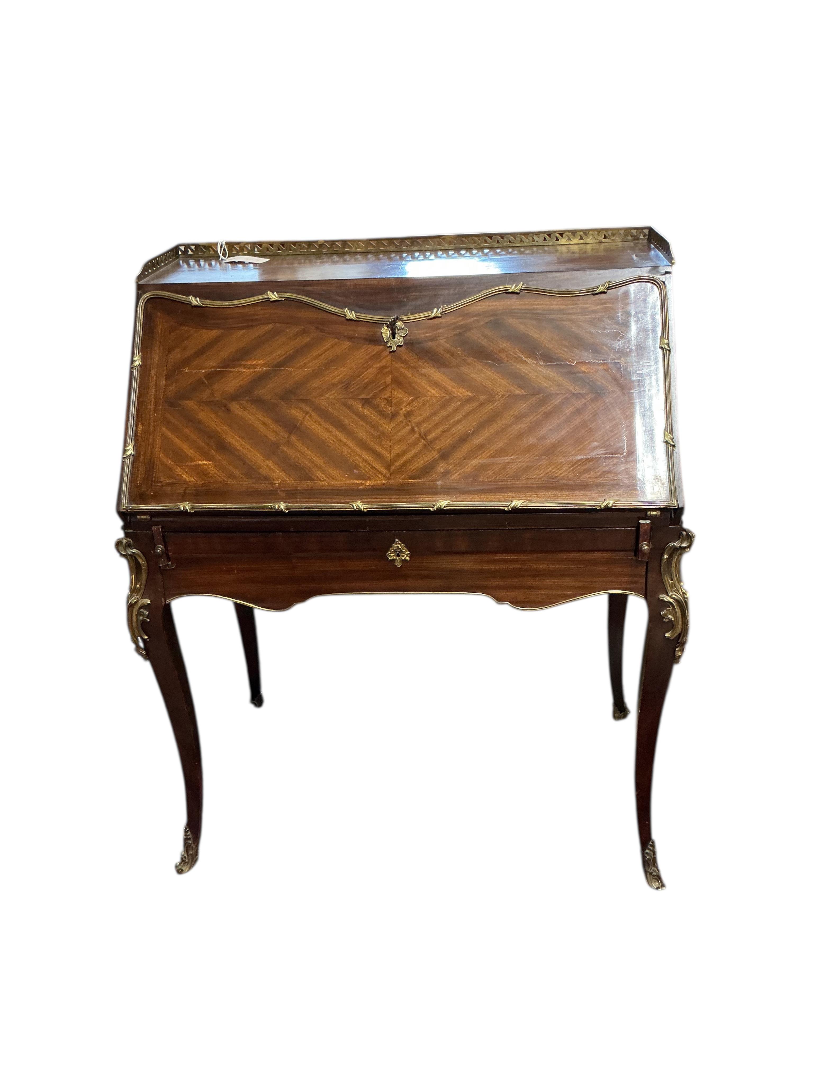 A Louis XVI style gilt metal mounted kingwood bureau de dame, width 84cm, depth 45cm, height 103cm